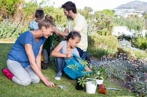 Professional garden maintenance services being performed
